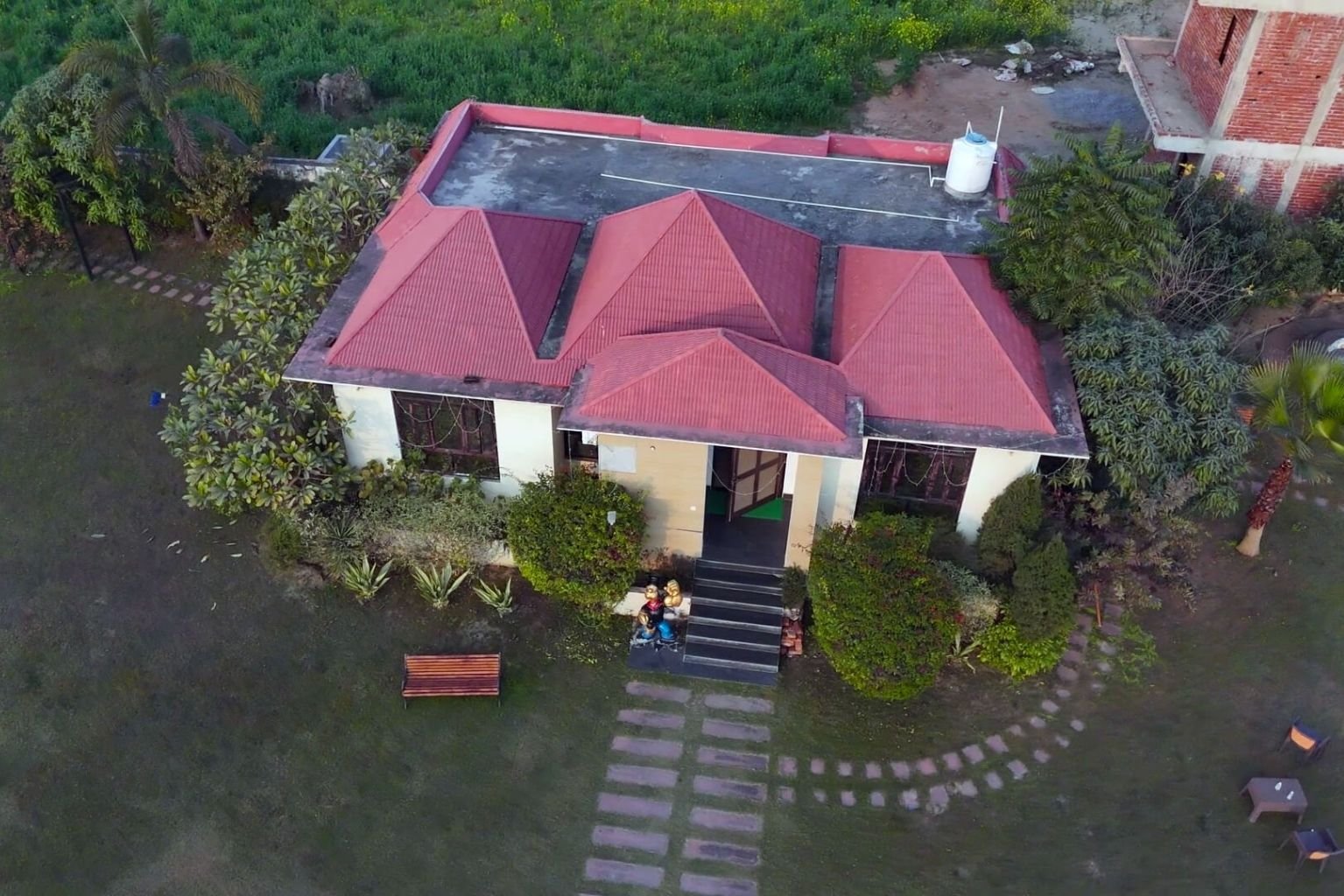 	Farmhouse for sale in Lucknow with landscaped garden at The Villagio